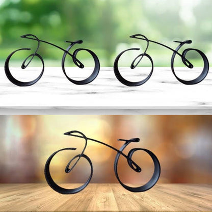 Minimalistisk cykelskulptur i metal med mat trådlook