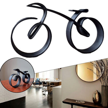 Minimalistisk cykelskulptur i metal med mat trådlook