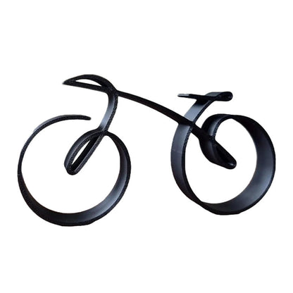 Minimalistisk cykelskulptur i metal med mat trådlook