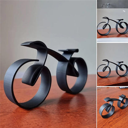Minimalistisk cykelskulptur i metal med mat trådlook