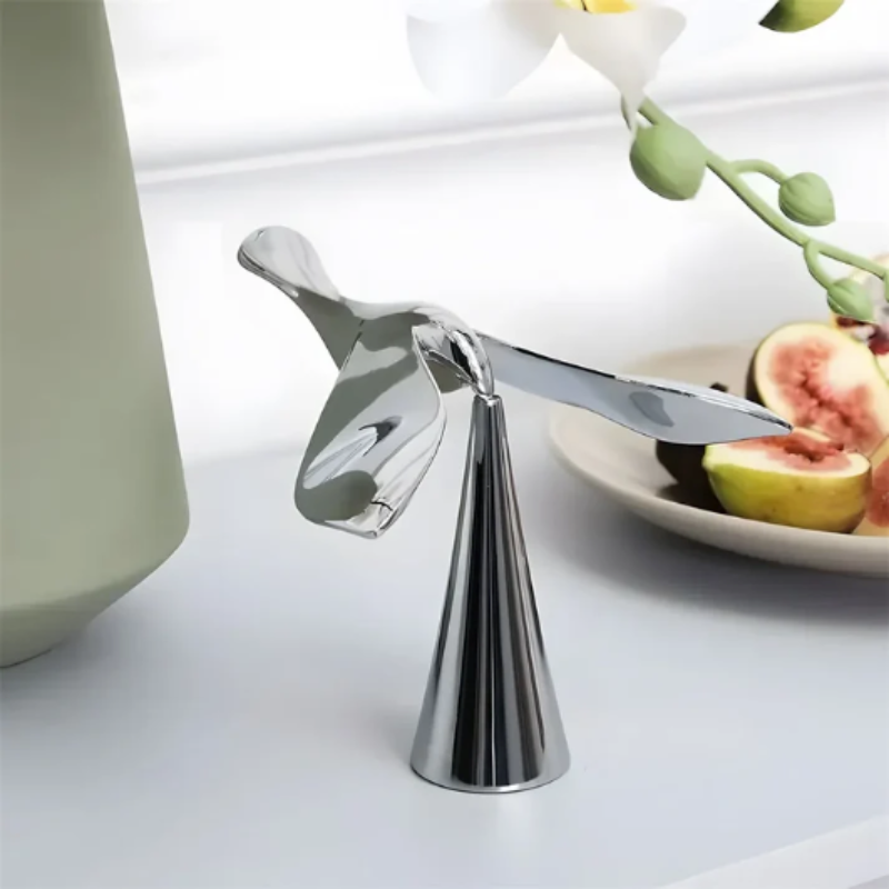 Balancerende flaskeåbner i fugledesign