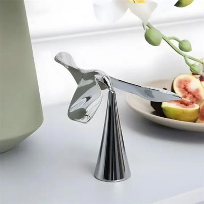 Balancerende flaskeåbner i fugledesign
