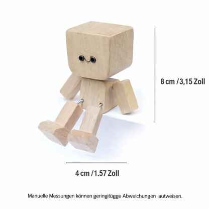 Træfigur med vippefunktion og udskiftelige ansigter