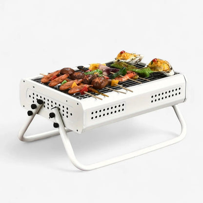 Bærbar kulgrill med sammenklappelige håndtag