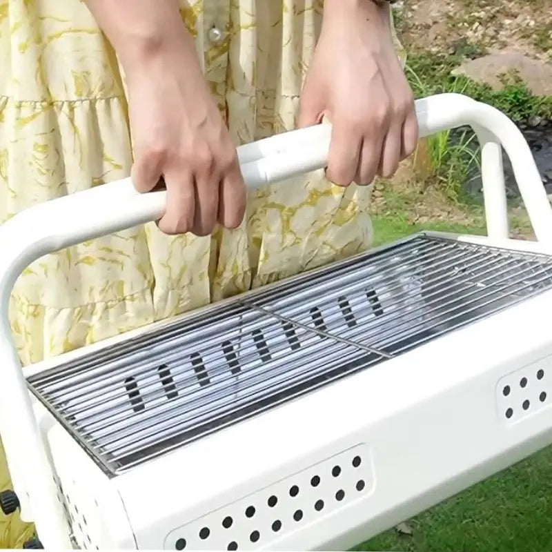 Bærbar kulgrill med sammenklappelige håndtag