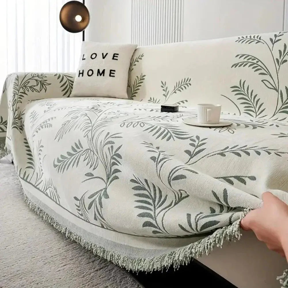 Sofaoverkast i chenille med jacquardvævede blade