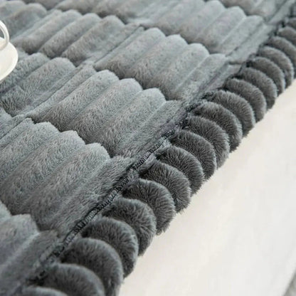 Elastisk sofabetræk i jacquard med flæsekant