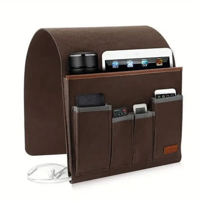 Opbevaringslomme i filt til sofaens armlæn