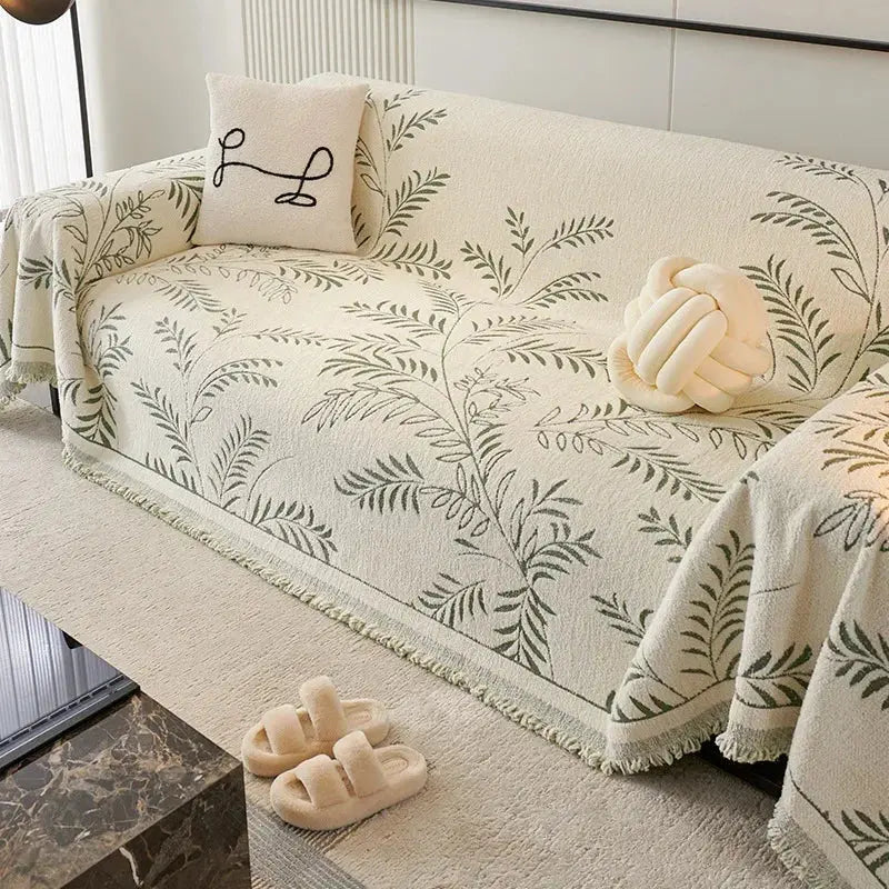 Sofaoverkast i chenille med jacquardvævede blade
