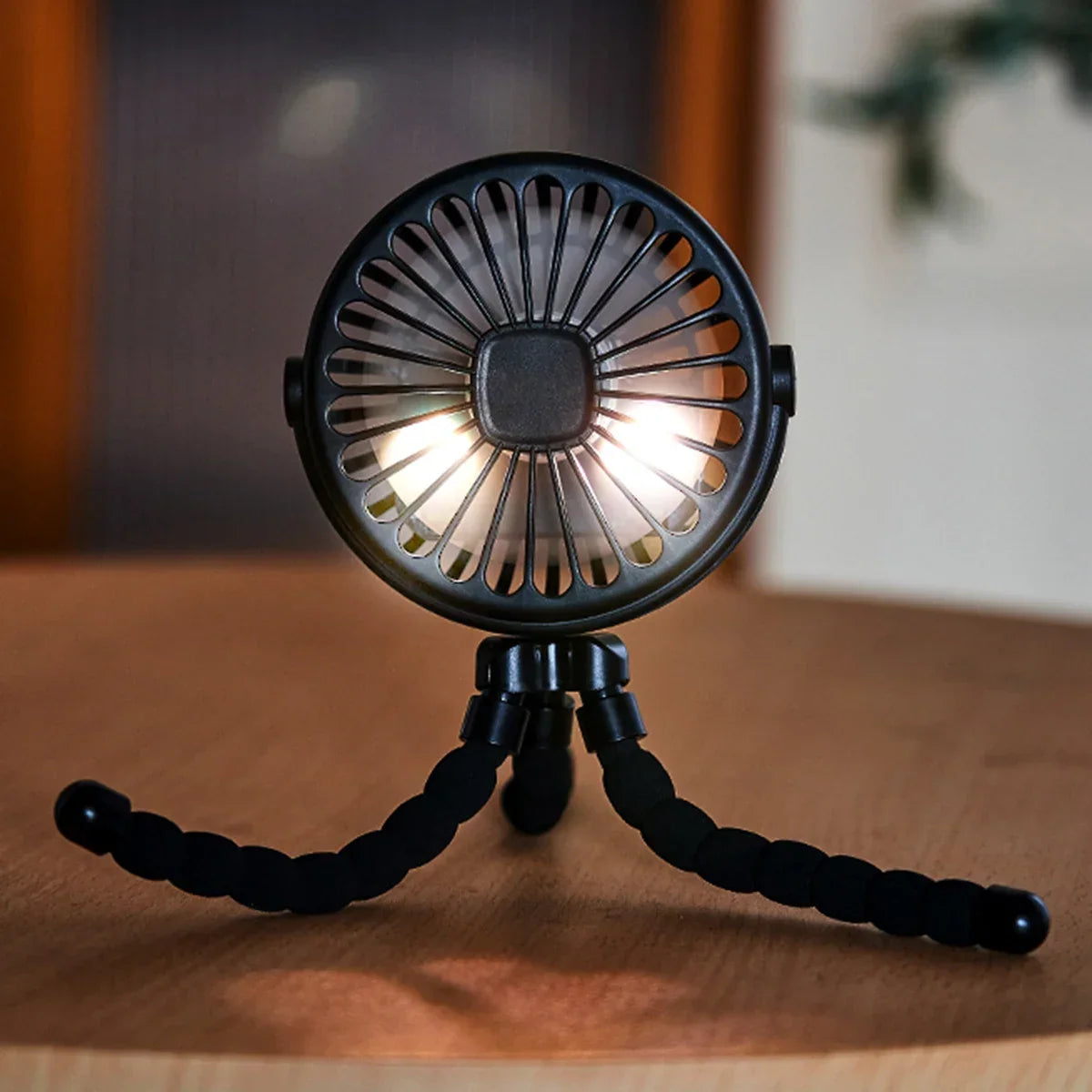 Genopladelig miniventilator med fleksible ben og LED-lys