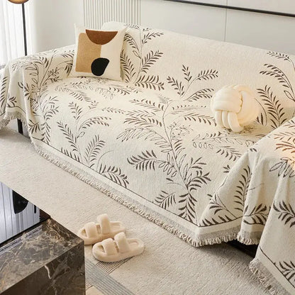 Sofaoverkast i chenille med jacquardvævede blade