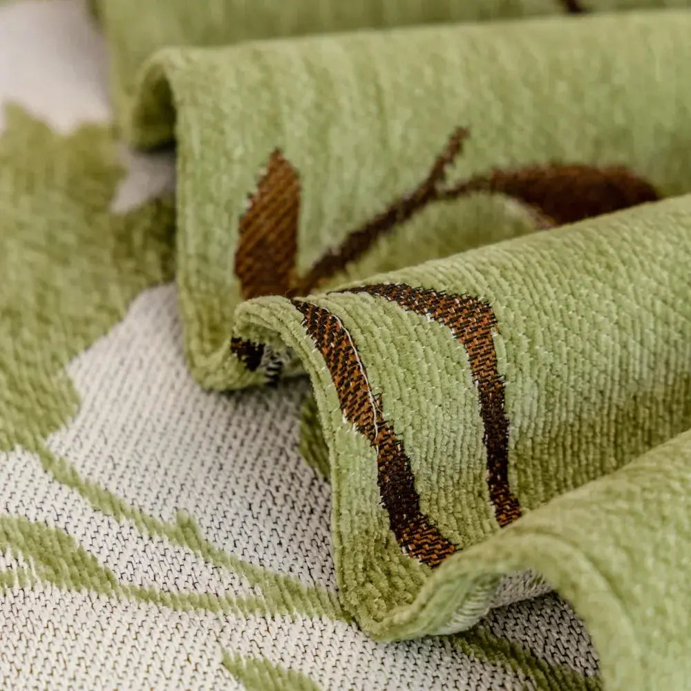 Sofaoverkast i chenille med mønster og kvaster