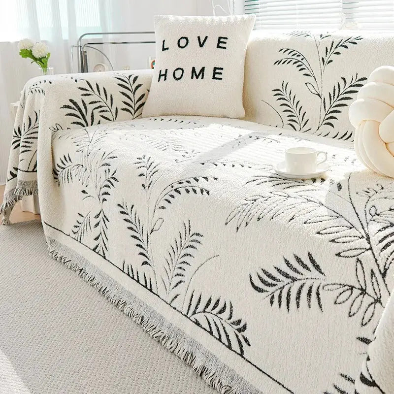 Sofaoverkast i chenille med jacquardvævede blade