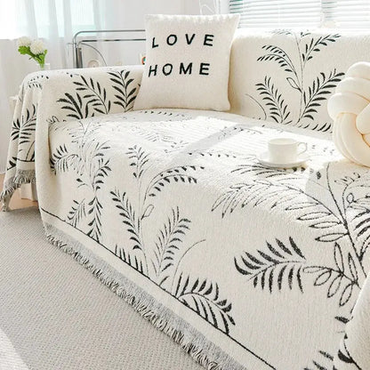 Sofaoverkast i chenille med jacquardvævede blade