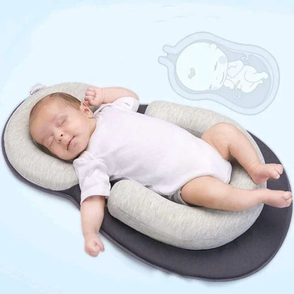 Transportabel babyrede med støttende kanter