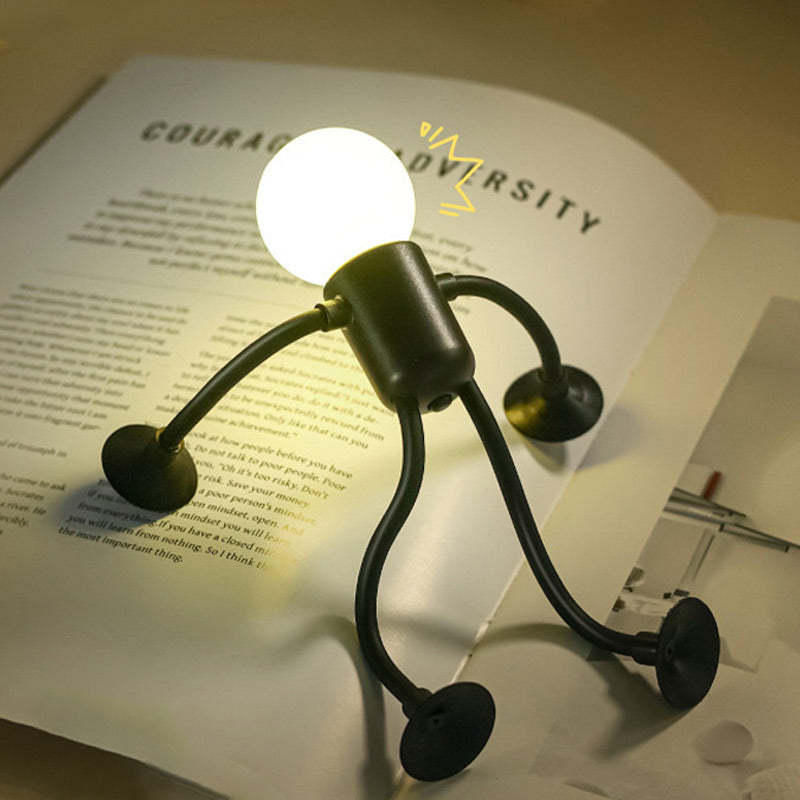 Dekorativ bordlampe i robotdesign