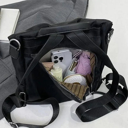 Multifunktionel tyverisikret crossbody-taske