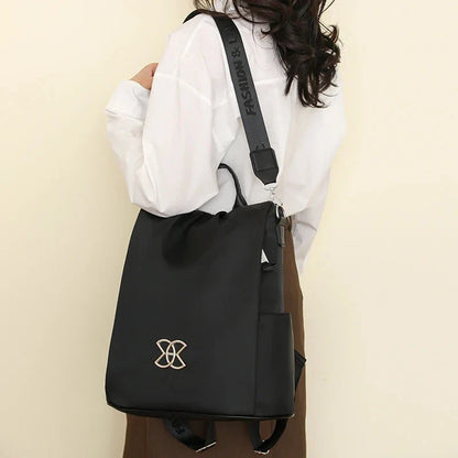 Multifunktionel tyverisikret crossbody-taske