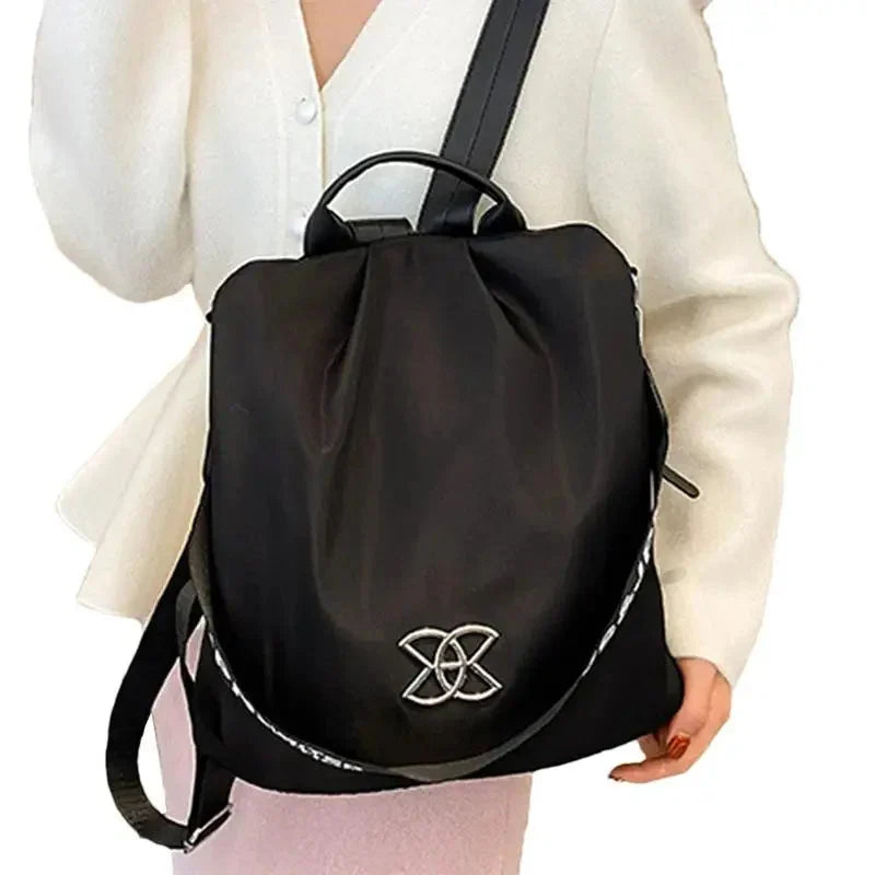 Multifunktionel tyverisikret crossbody-taske