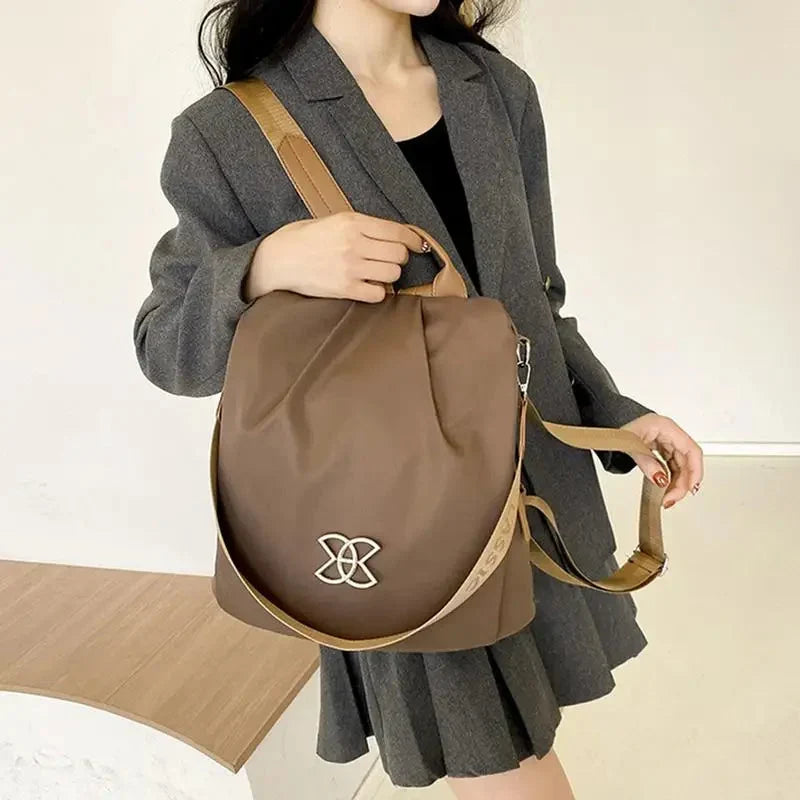 Multifunktionel tyverisikret crossbody-taske