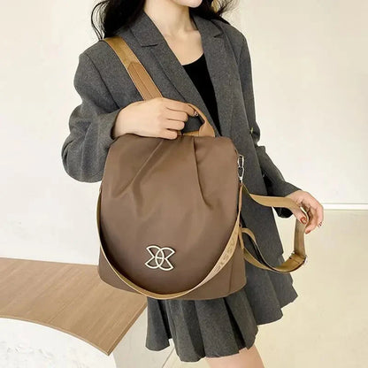 Multifunktionel tyverisikret crossbody-taske