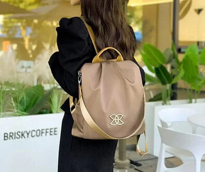 Multifunktionel tyverisikret crossbody-taske