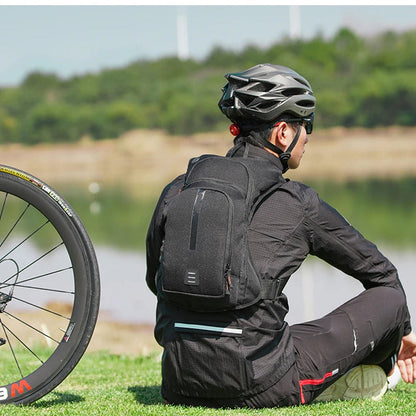 Cykelrygsæk med krydssele og refleksdetaljer