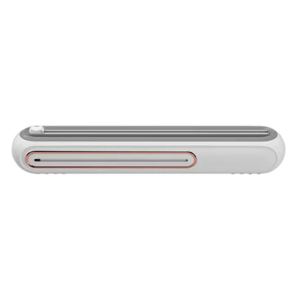 Magnetisk foliedispenser med skydeskærer
