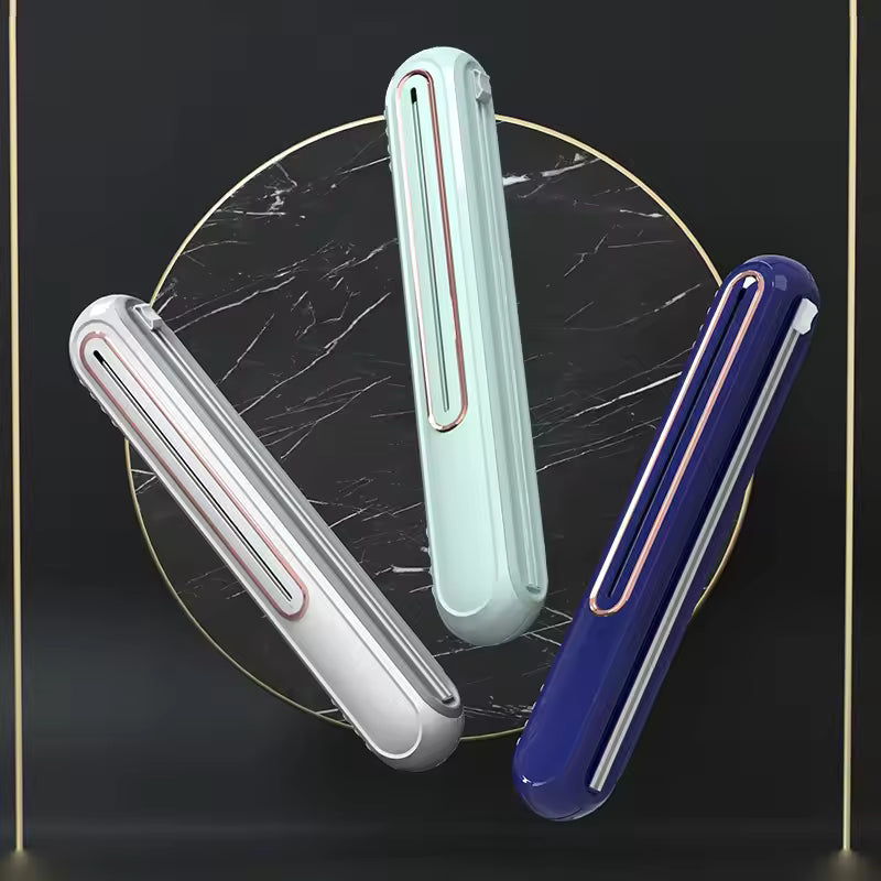 Magnetisk foliedispenser med skydeskærer