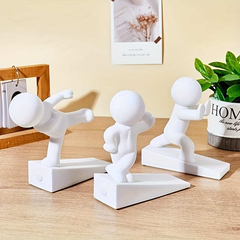 Dekorativ dørstopper i gummi med figurmotiv