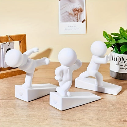 Dekorativ dørstopper i gummi med figurmotiv