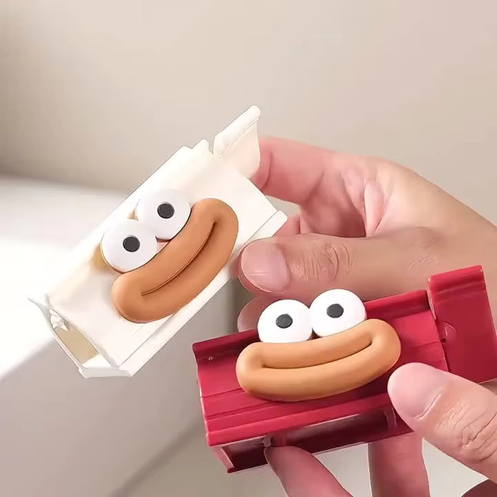 Tubeklemme med figurmotiv til tandpasta