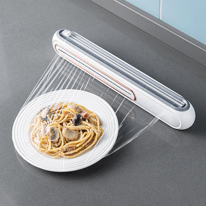 Magnetisk foliedispenser med skydeskærer