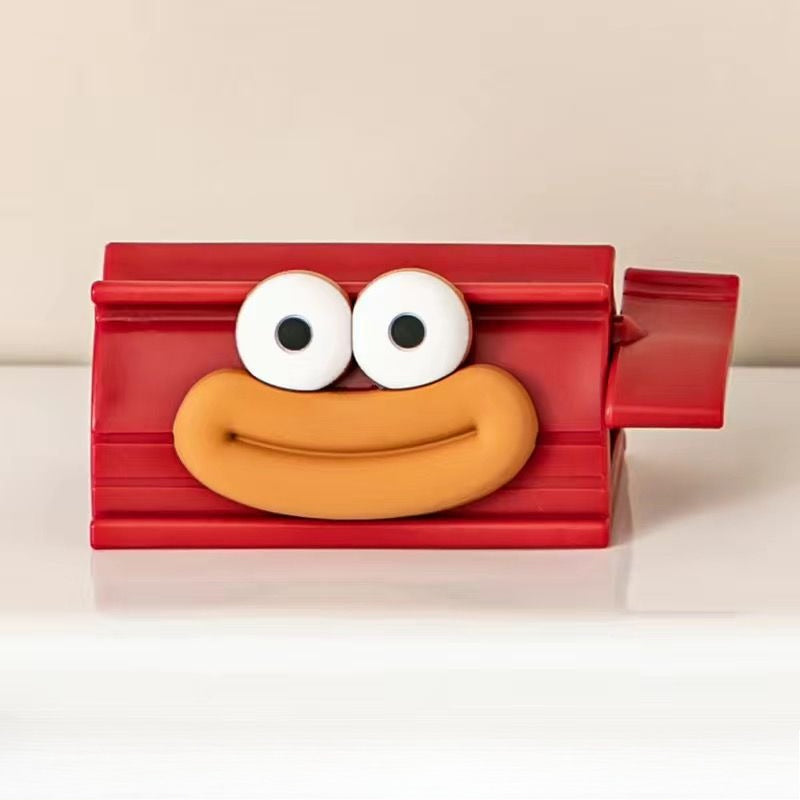 Tubeklemme med figurmotiv til tandpasta