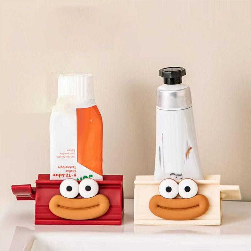 Tubeklemme med figurmotiv til tandpasta