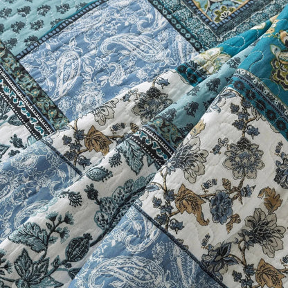 Vendbart sengetæppesæt med blomstret patchwork – 3 dele