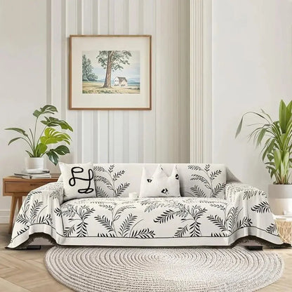 Sofaoverkast i chenille med jacquardvævede blade